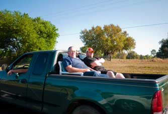 Is It Illegal to Ride in a Truck Bed on the Highway but Legal on Local Roads?