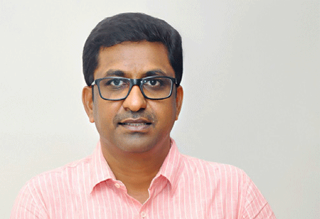  E. Karthikeyan, Proprietor